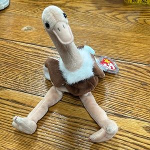 Ty beanie baby struck.  Stretch was born September 21, 1997, “with tag errors “